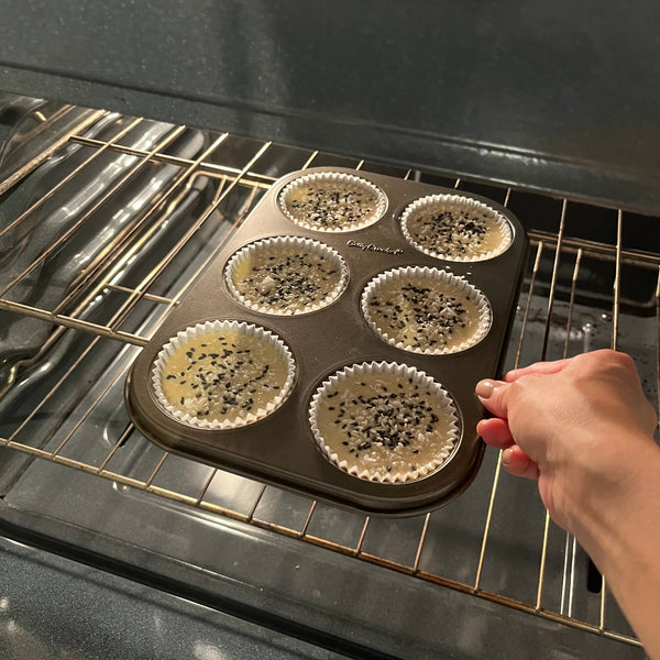 placing the mochi muffins in the office